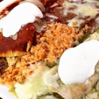 1 vegetarian Enchilada Plate · With green or red salsa, rice, beans, sour Cream cheese, and corn or flour tortilla.