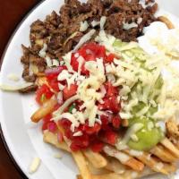 Super Steak Fries · French fries, cheese, sour cream, guacamole, pico de gallo and choice of meat. (steak, grill...