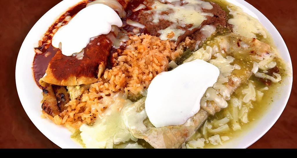 1 Enchilada Plate · 1 enchilada served with, red or green sauce, rice, beans, cheese, sour cream, pico de gallo and choice of meat (steak, grilled chicken, carnitas, al pastor), corn or flour tortilla.