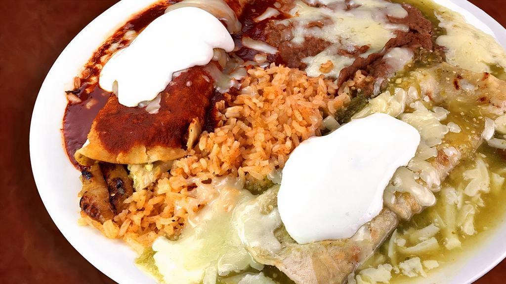 2 Enchilada Plate · 2 enchiladas served with, red or green sauce, rice, beans, cheese, sour cream and  choice of meat (steak, grilled chicken, carnitas, al pastor) flour or corn tortilla