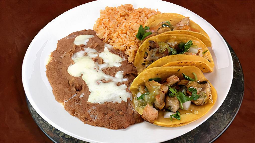 3 Taco Plate · 3 tacos served with rice, beans and choice of meat (steak, grilled chicken, carnitas, al pastor).