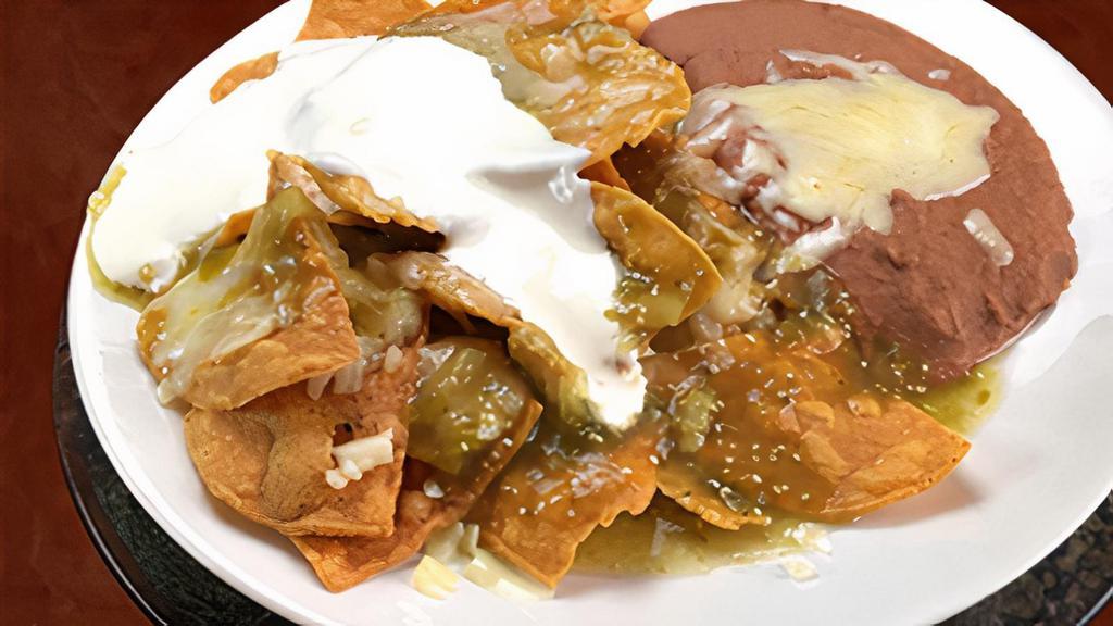 Chilaquiles  · Green or Red salsa, beans, cheese and sour cream.