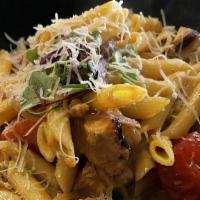 Penne Pasta · Grilled chicken breast, onions, tomatoes, cipollini cream sauce.