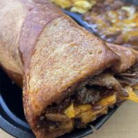 Kinder's BBQ Beef Sandwich · Tender beef stuffed in a fresh sourdough roll with onions and shredded cheese. Hot sandwiche...