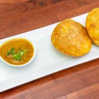 Kachori with Aloo Bhaji · Fried puff bread, stuffed with lentils mixture, served with potato curry.