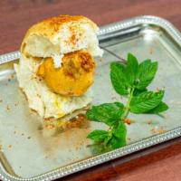 Vada Pav (1 Piece) · Deep-fried Indian spiced potato dumpling placed inside a bread bun, served with chutney.