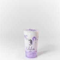Ube Milk · Fresh Ube Puree topped off with Whole Milk.

 (Other creamer options available).