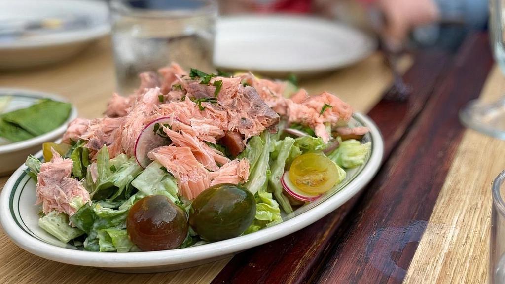 Smoked Salmon Salad · Little gem lettuce, green goddess dressing, fried green peas, cucumber, cherry tomatoes, smoked salmon
