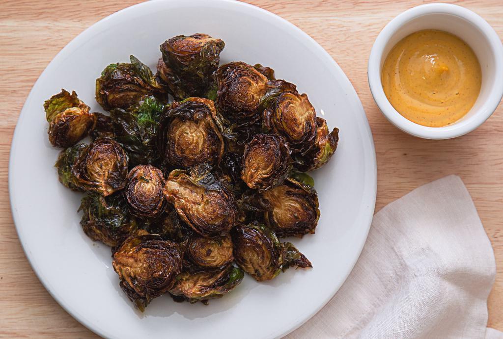 Crispy Brussels Sprouts · Brussels sprouts cooked in sustainably sourced palm oil and served with housemade chipotle aioli (contains eggs). Good for: gluten-free, paleo, keto, vegetarian, vegan (no aioli), plant-based, and whole30 (no aioli - honey).