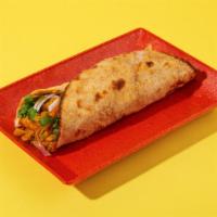 Vegetable Korma Roll · With sliced onions and your choice of chutney in a roti roll.