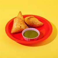 Vegetable Samosa · Filled with potato and peas.