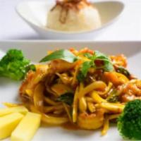 (C) Mango Shrimp · Juicy shrimp tossed in wok with basil, onions and mango purée. Served with fresh mango on th...