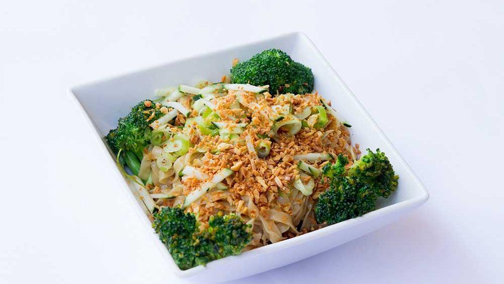 (C) Garlic Noodle · Egg noodles, crisp garlic and scallions tossed in a special house sauce. Served with fried tofu.