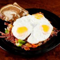 El Paso · Home-made corned beef hash with bell peppers and onions over potatoes with melted cheddar, t...