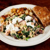 Provence · Fresh salmon with spinach, red onions and goat cheese. Made with three eggs and served with ...