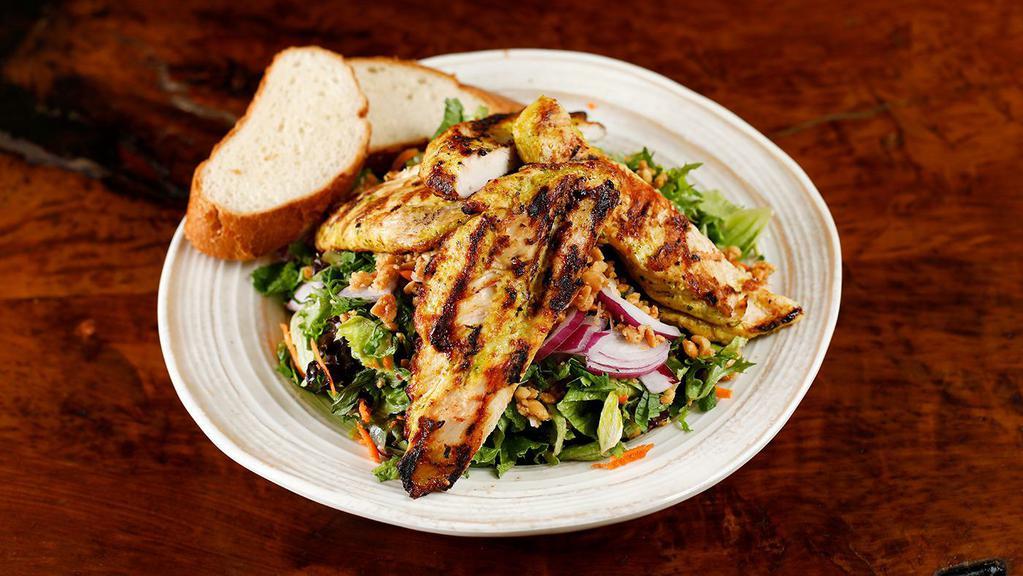 Bangkok Salad · Organic mixed greens served with ginger curry marinated grilled chicken, red onion, mint, shredded carrots, cilantro, roasted peanuts and spicy lemongrass vinaigrette.