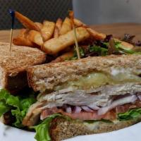 Pioneer Sandwich · Roasted turkey breast with lettuce, red onions, dijon, mayo and dill havarti cheese.