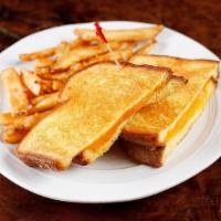Grilled Cheese Sandwich · Served with french fries.