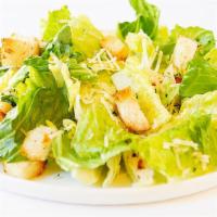 Caesar Salad · Crisp romaine lettuce, parmesan cheese, homemade garlic croutons.