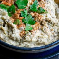 Baba Ghanoush · Served with pita bread.