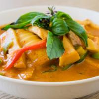 Red Curry · Red curry paste with coconut milk bamboo shoots, bell pepper, basil, green bean, and choice ...