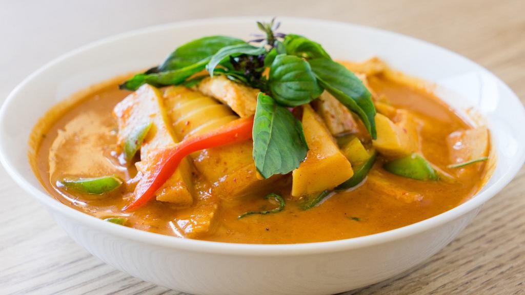 Red Curry · Red curry paste with coconut milk bamboo shoots, bell pepper, basil, green bean, and choice of meat or fried tofu