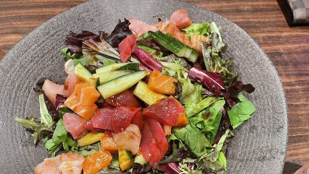 Poke Salad · Mixed Fish, Green Salad, Seaweed Salad, and Cucumber