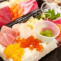 Deluxe Chirashi**1 · Mixed raw fish with blue fin tuna belly, uni and sushi rice