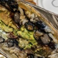 Vallejo Burrito · Onions, peppers, yucca fries, stewed black beans & rice, avocado, lettuce, pico de gallo, ch...