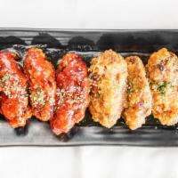 Chicken Wings (8 Pieces) · Fried chicken with choice of house-made sauce.