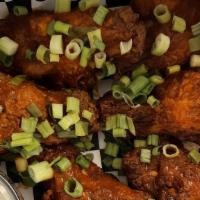 Buffalo Wings · Spicy buffalo wings served with choice of homestyle ranch or blue cheese dip