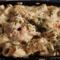 Pasta Alfredo · Penne pasta in our rich Alfredo sauce with shaved parmesean cheese and a side of garlic brea...