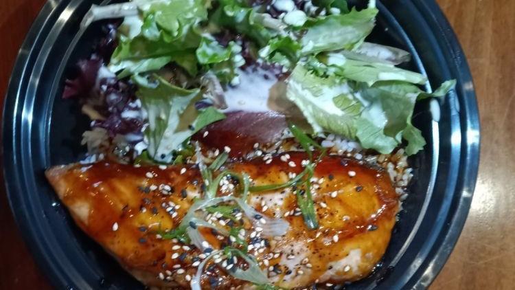 Salmon Teriyaki · Grilled salmon with teriyaki sauce, rice and spring mix.
