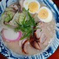 Tonkotsu Ramen · Creamy pork broth, cha shu pork, egg, bamboo, cabbage, scallion, and mushroom.