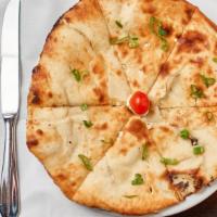 Goat Cheese Naan · Stuffed with goat cheese, green onions, and bell peppers.