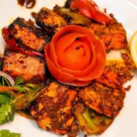 Ajwine Paneer Tikka · Chunks of paneer marinated in spices and grilled in a tandoor.