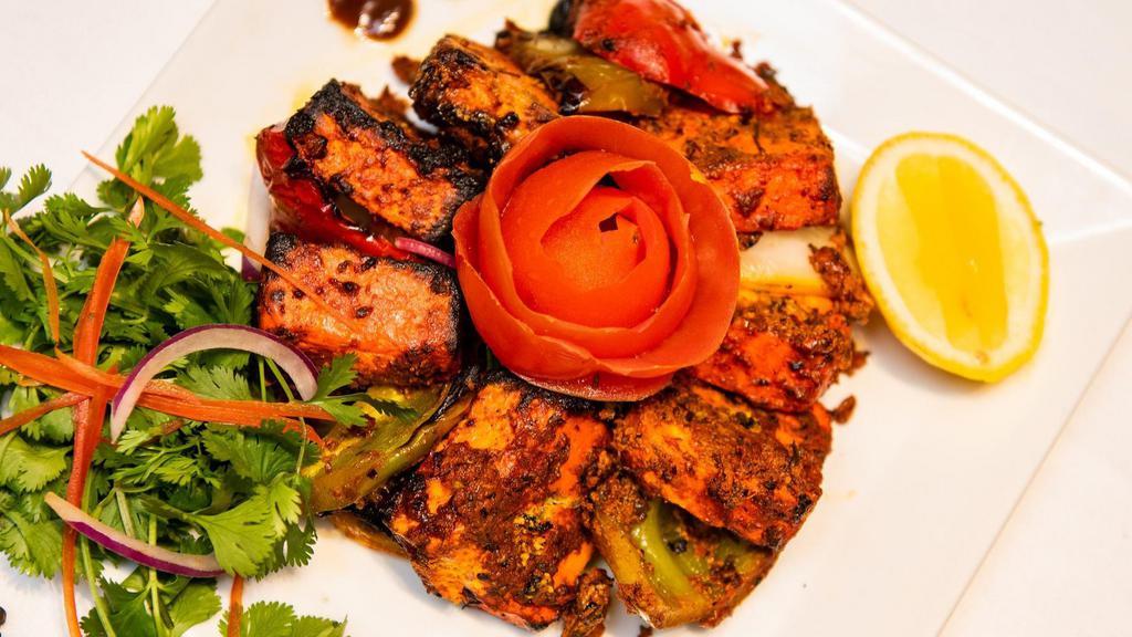 Ajwine Paneer Tikka · Chunks of paneer marinated in spices and grilled in a tandoor.
