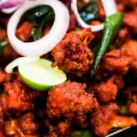 Gobi 65 · Cauliflower coated with besan flour with spices and deep fried