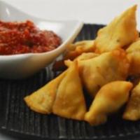 Cocktail Samosa · Cocktail green peas samosas are tasty treat. These bite-sized crispy samosas are filled with...