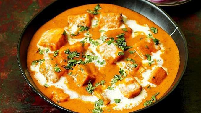 Paneer Butter Masala · Soft cottage cheese cubes are simmered in creamy, buttery, cashew nuts onion-tomato gravy