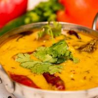 Peelidhal · Moong dal cooked with onion, tomatoes, garlic ,whole red chilli