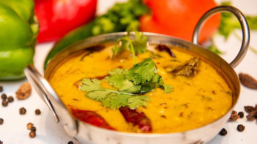Peelidhal · Moong dal cooked with onion, tomatoes, garlic ,whole red chilli