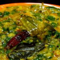Dal Palak · Toor dal and spinach cooked with chilli ,garlic tampering with mustard and curry leaves