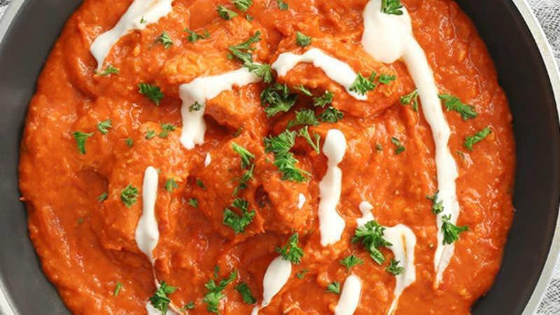 Butter Chicken Masala · Chicken marinated in yogurt and spices cooked in tomato puree and butter.