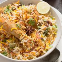 Chicken (Murgh) Dum Biryani · Hyderabadi Speciality of subtly chicken and basmati rice dem cooked in a sealed degh