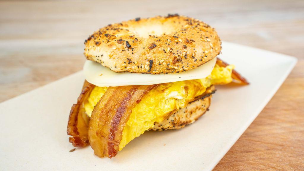 New York Style · Toasted bagel with provolone bacon & two eggs.