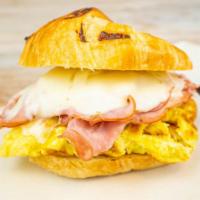 Breakfast Croissant · Croissant with egg + ham + cheese.