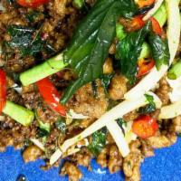 Pad Kra Pao (Stir-Fried Basil) · Savory, sweet undertones of pan fried ground pork with basil, chili, long beans, and onion. ...