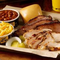 3 Meat Plate · Choose your favorite combination of three slow-smoked meats served with two sides and a roll.