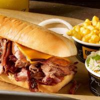 Westerner Sandwich Plate · Texas sized sandwich, with your choice of two slow-smoked meats and cheddar cheese on a toas...
